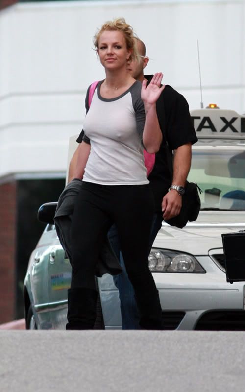 A bra-less and make-up free Britney Spears was spotted leaving her hotel in 